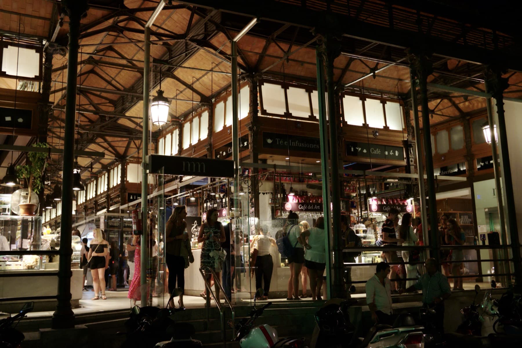 People dining inside Mercado de San Miguel in Madrid
