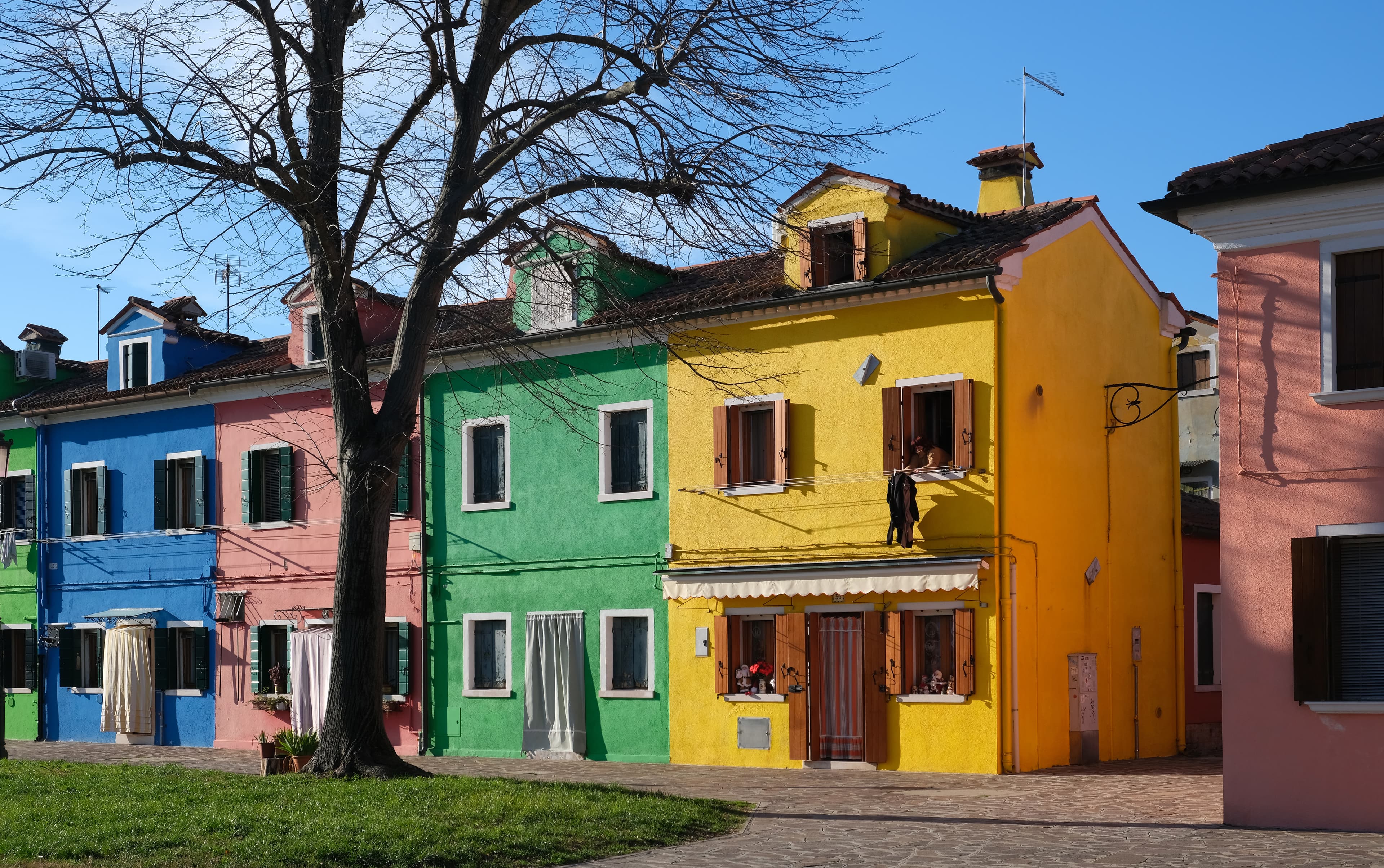 Colorful houses along a canal in Burano in the Venetian lagoon